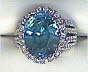 LADIES RING DIAMOND & BLUE ZIRCONIA